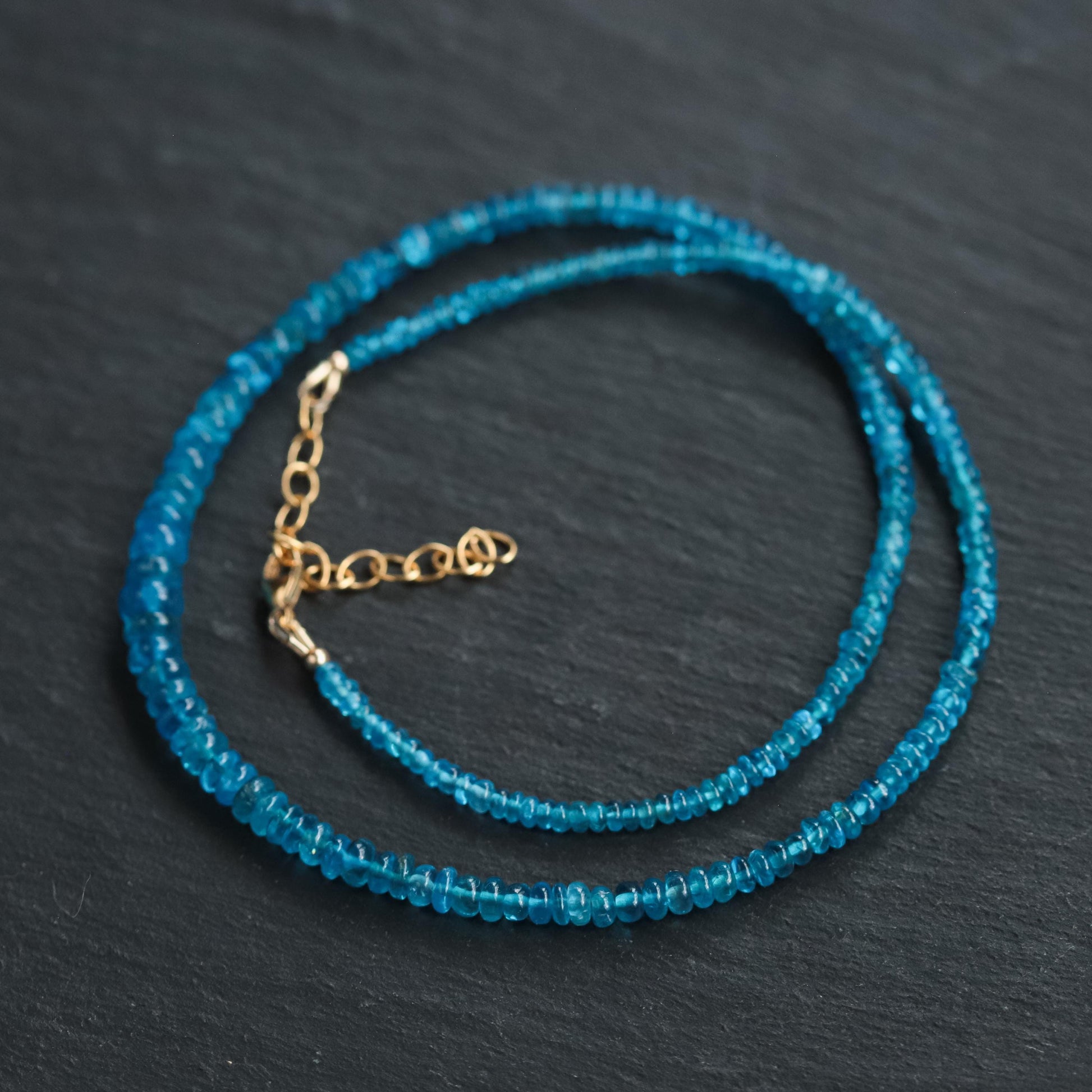 Earthly Abundance Gemmy Apatite necklace featuring a vibrant blue apatite pendant on a delicate chain.