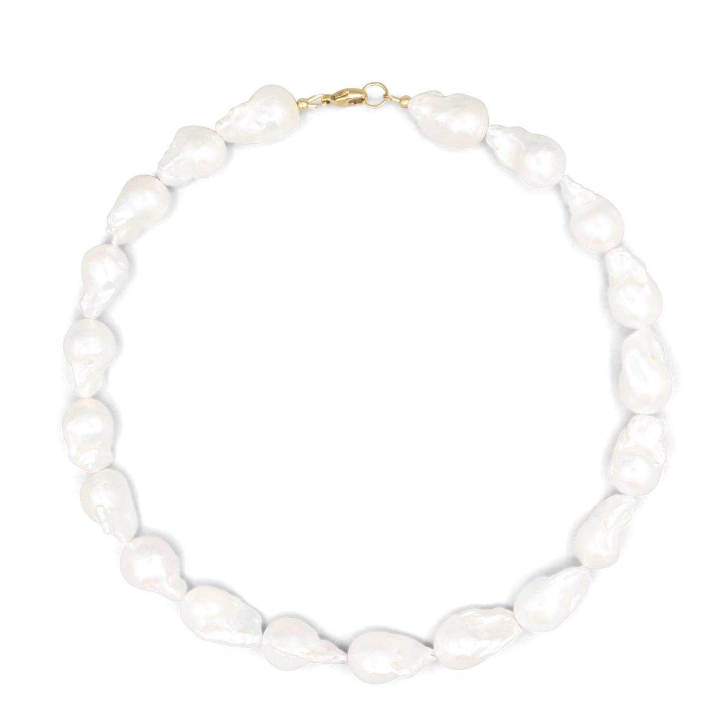 Elegant Baroque Pearl necklace by Earthly Abundance featuring irregular-shaped pearls on a delicate chain.