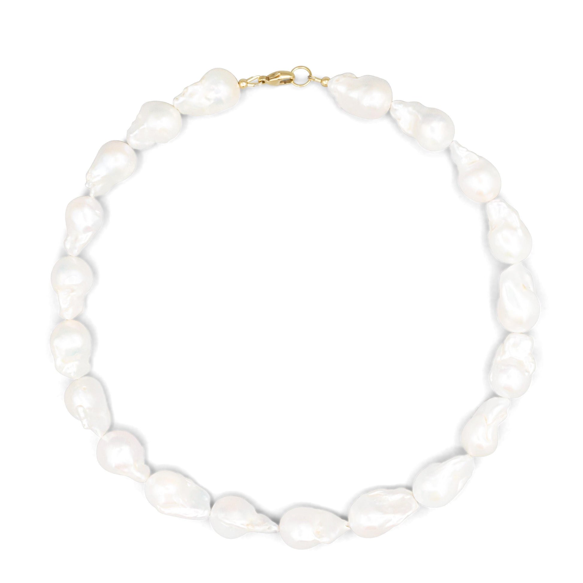 Elegant Baroque Pearl necklace by Earthly Abundance featuring irregular-shaped pearls on a delicate chain.