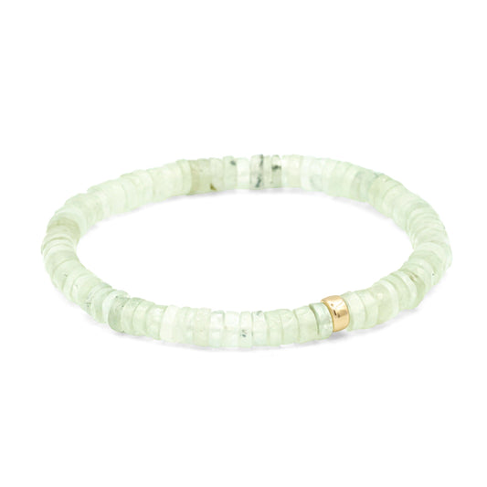 Prehnite beaded bracelet by Earthly Abundance featuring smooth green oval beads on an elastic cord.