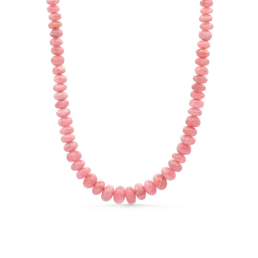 Pink Rhodochrosite necklace featuring polished gemstone beads on a delicate silver chain, showcasing natural mineral patterns.