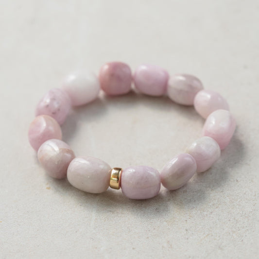 Kunzite nugget bracelet in 14K gold from Earthly Abundance, featuring smooth pink kunzite stones linked together.