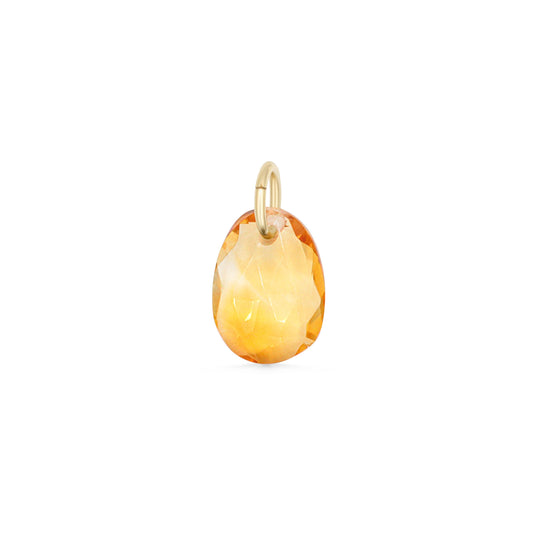 Citrine pendant in 14K gold with a polished yellow gemstone, featuring a delicate gold setting and chain.