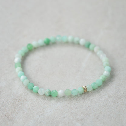 Chrysoprase bracelet with 14K gold accents from Earthly Abundance, featuring polished green gemstone beads on a delicate chain.