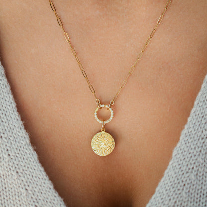 Gold vermeil charm holder with white topaz accents, 3 microns thick, by Earthly Abundance, featuring a decorative design and sparkling stones.