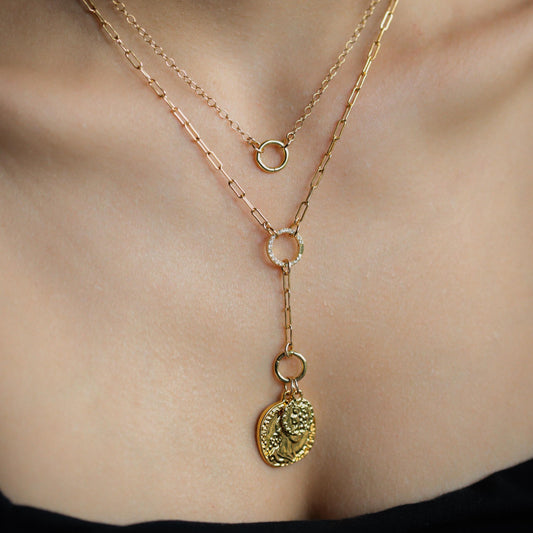 Gold vermeil charm holder with white topaz accents, 3 microns thick, from Earthly Abundance. Stylish jewelry accessory.