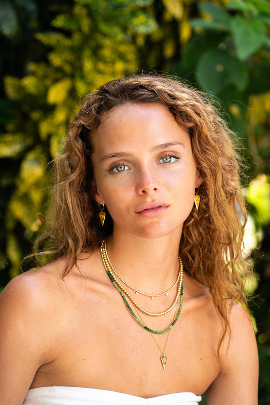 Tsavorite ombre necklace featuring vibrant green gemstones set in a delicate chain by Earthly Abundance.
