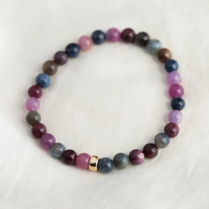 Elegant Ruby and Sapphire bracelet in 14K gold featuring vibrant gemstones from Earthly Abundance.
