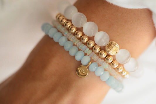 Faceted aquamarine evil eye