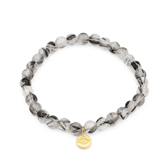 Black rutilated quartz with evil eye charm