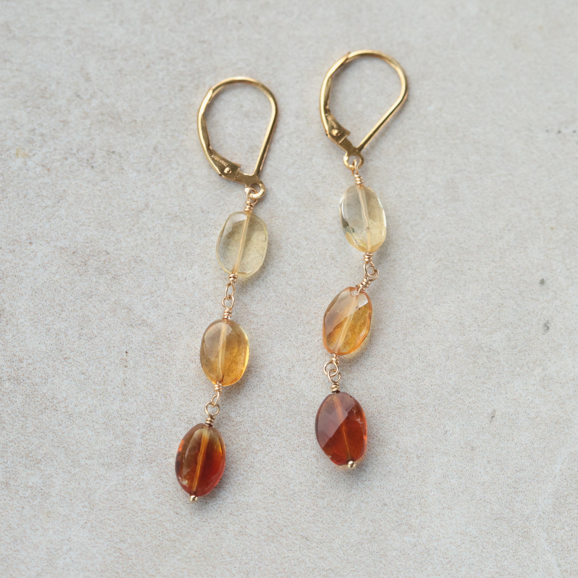 Citrine drop earrings with 14K gold-filled settings, featuring faceted citrine gemstones and elegant gold hooks.
