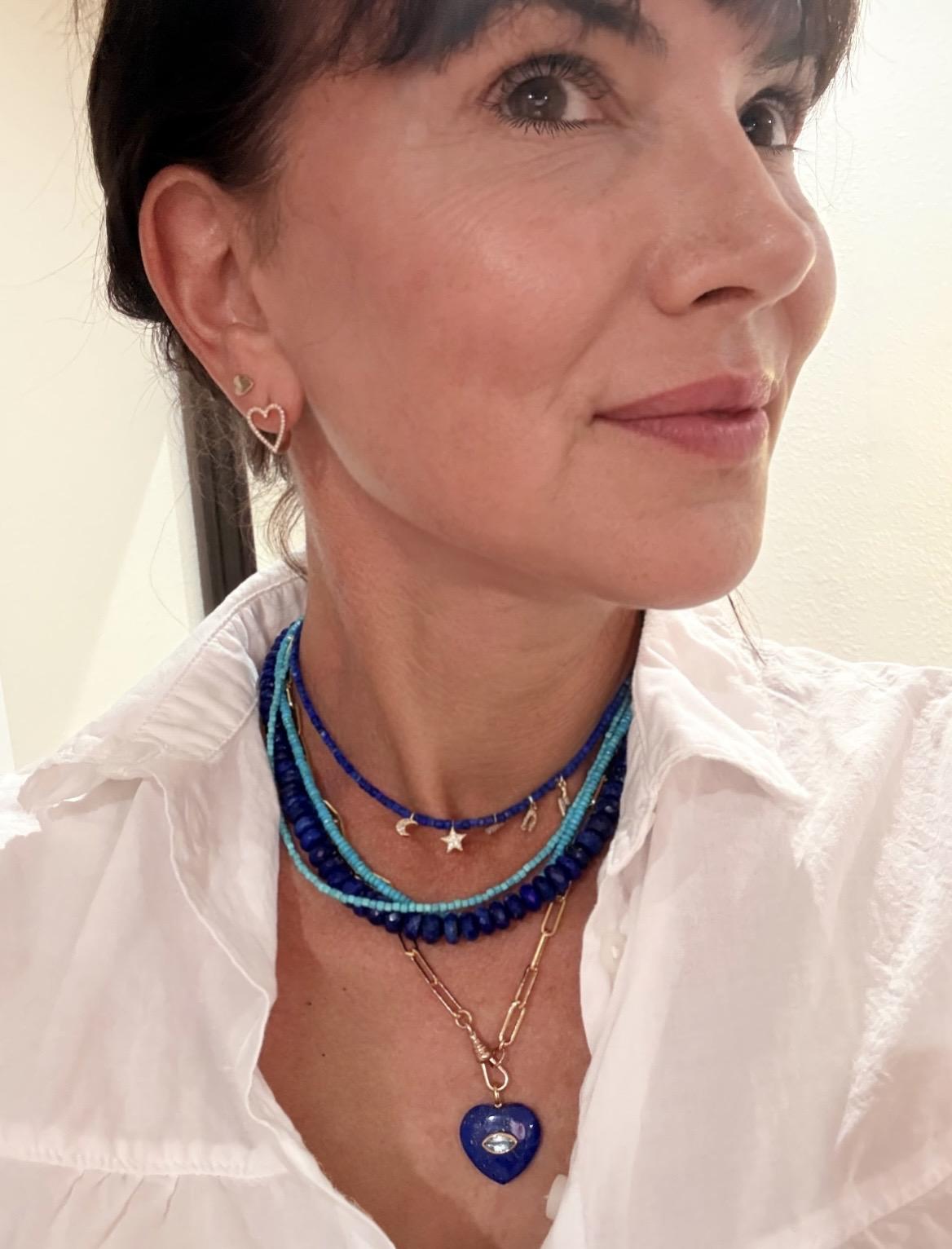 Customer layering lapis lazuli, turquoise and a gold filled paperclip chain