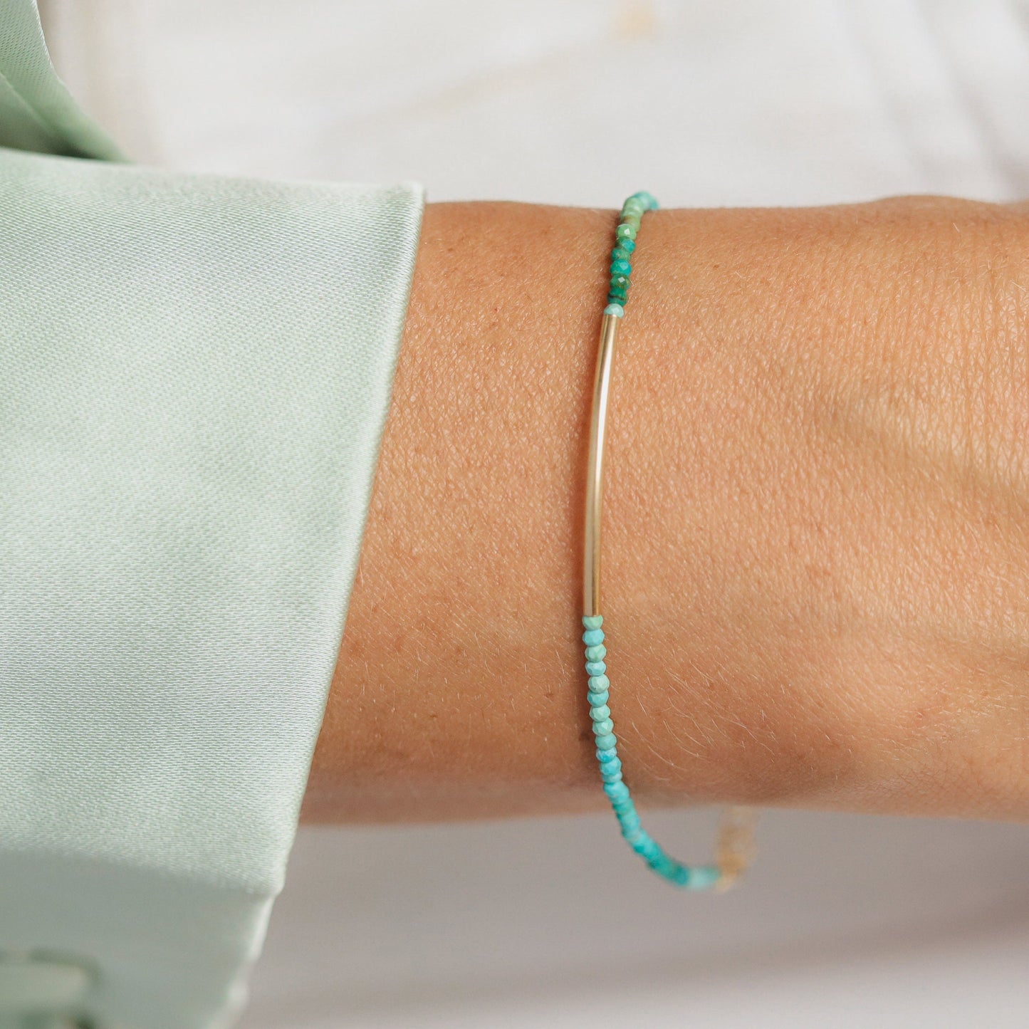 Azure Line Turquoise Bracelet by Earthly Abundance Jewelry featuring vibrant turquoise beads and a sleek silver clasp.