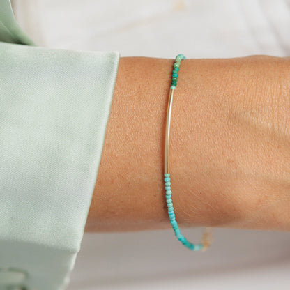 Azure Line Turquoise Bracelet by Earthly Abundance Jewelry featuring vibrant turquoise beads and a sleek silver clasp.