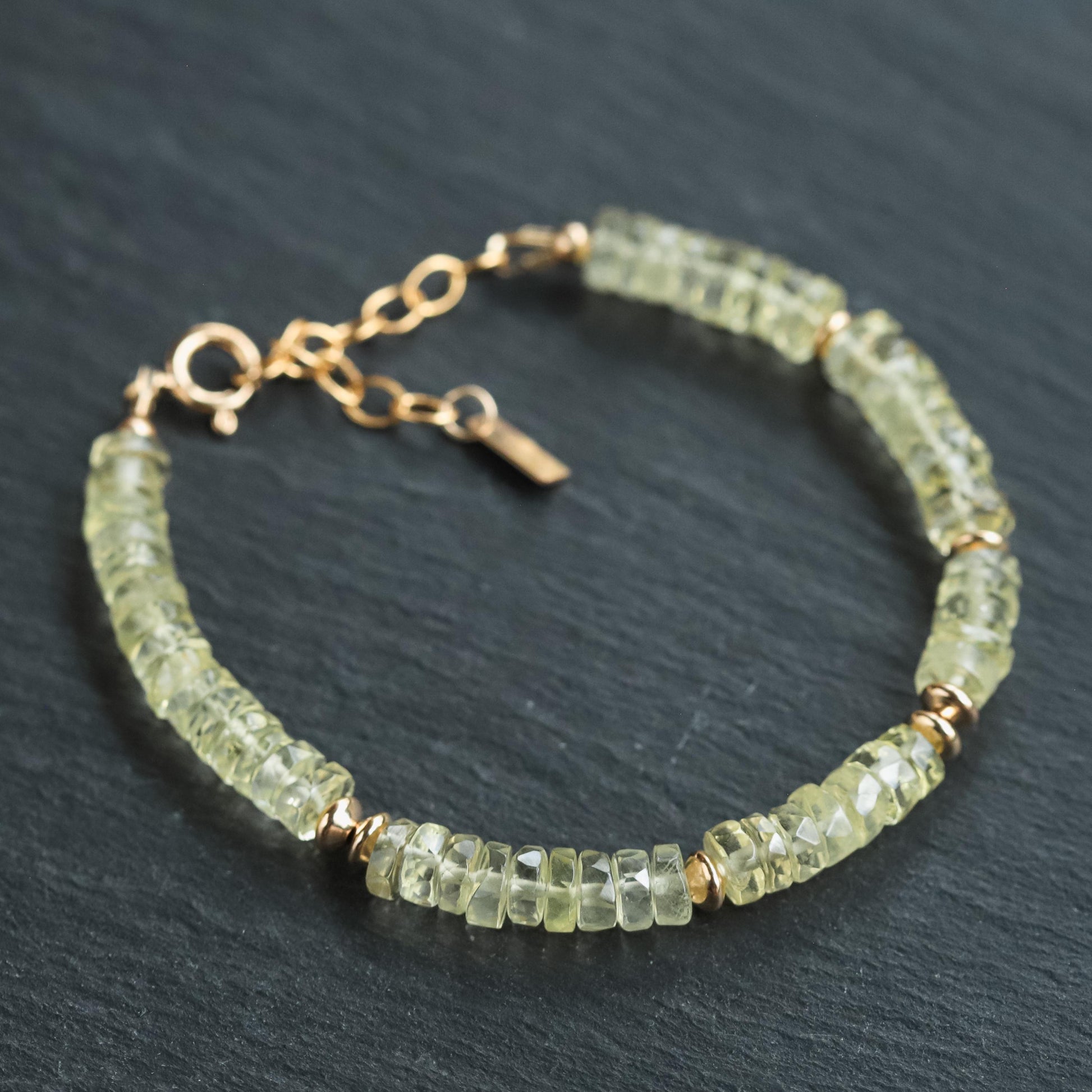 Natural Lemon Quartz bracelet by Earthly Abundance featuring yellow lemon quartz beads on an elastic stretch band.