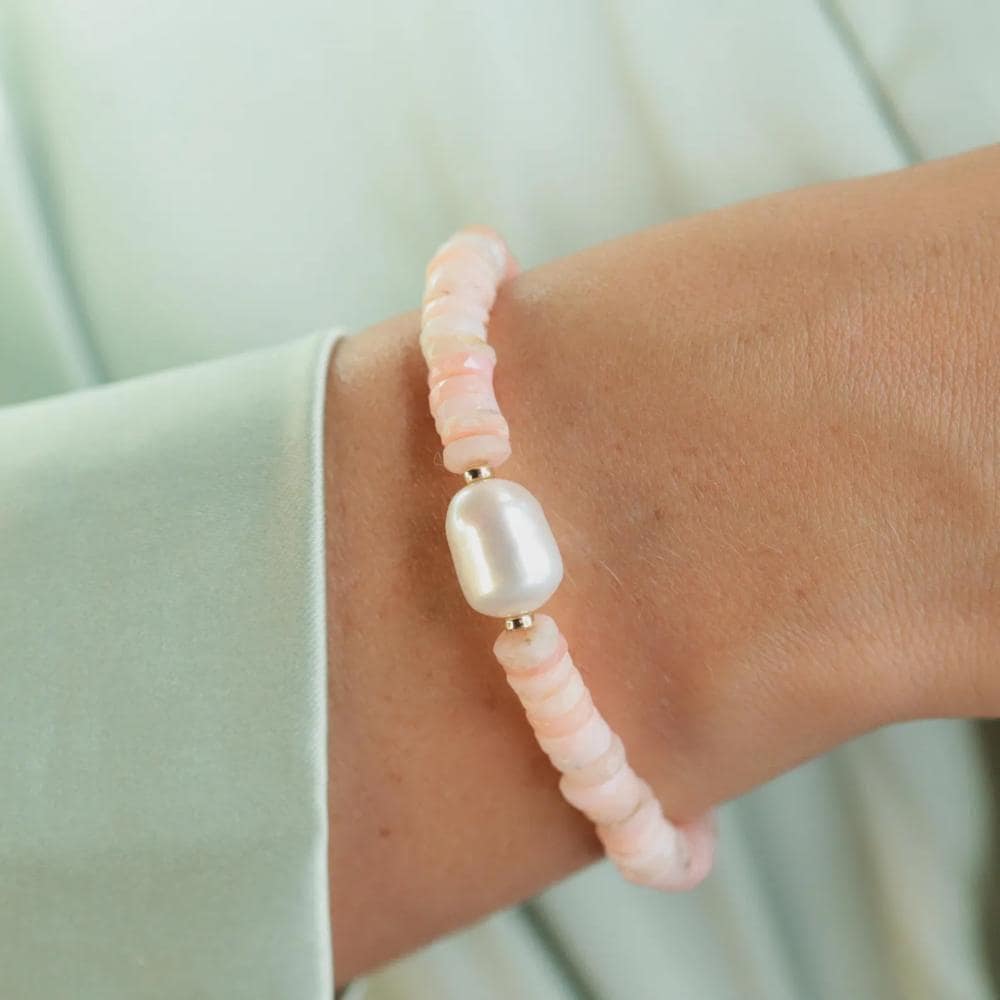 Heishi gemstone and pearl bracelet by Earthly Abundance featuring multicolored beads and delicate silver accents.