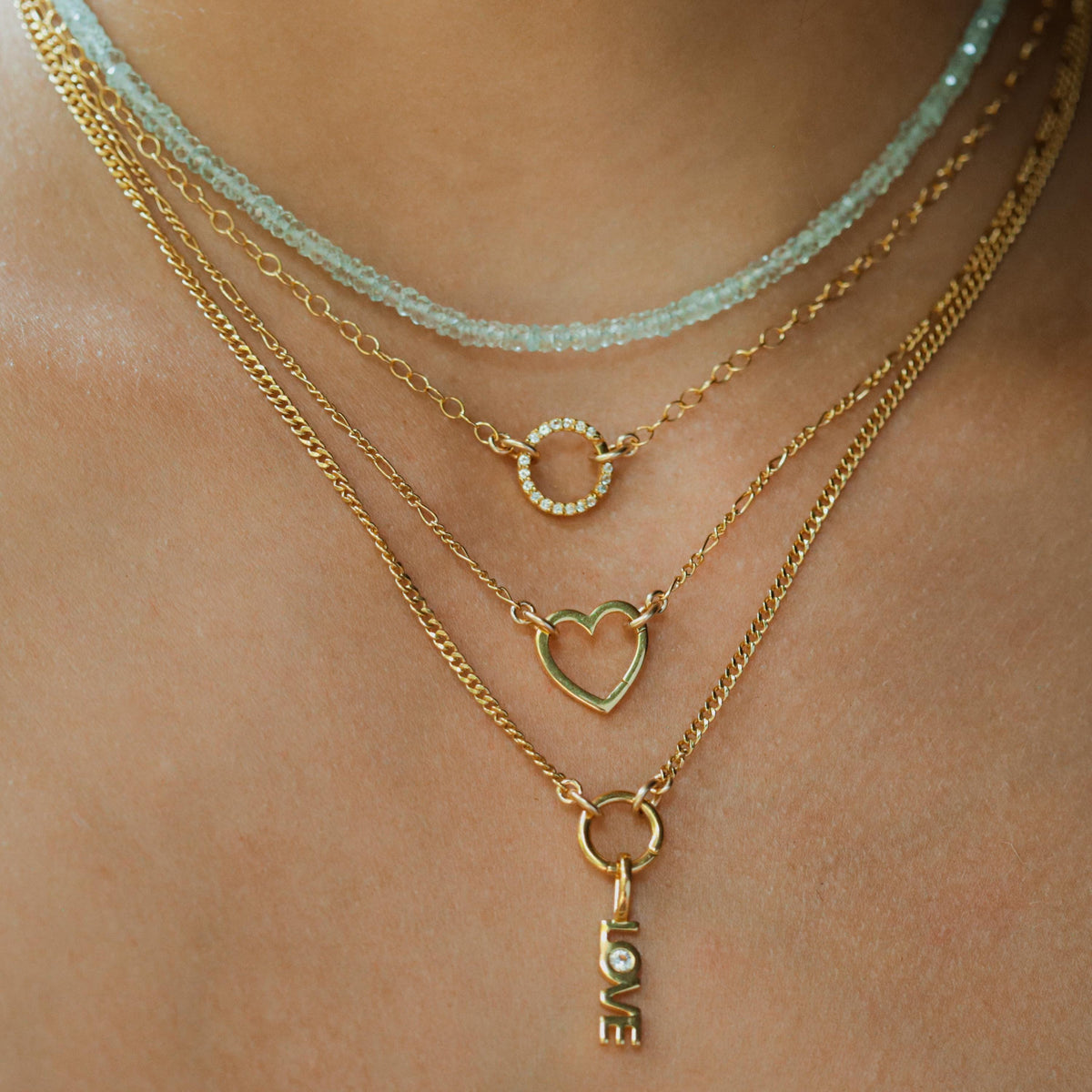 Aquamarine choker necklace by Earthly Abundance featuring a row of polished aquamarine gemstones on a delicate chain.