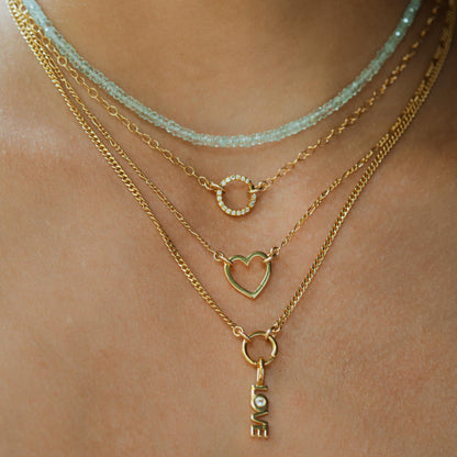 Aquamarine choker necklace by Earthly Abundance featuring a row of polished aquamarine gemstones on a delicate chain.