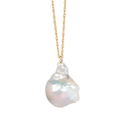Baroque pearl necklace from Earthly Abundance Jewelry featuring irregular-shaped, lustrous pearls on a delicate chain.