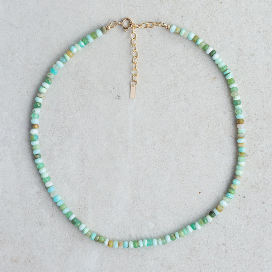 Peruvian Opal necklace with 14K gold-filled chain from Earthly Abundance, featuring a polished oval opal pendant.