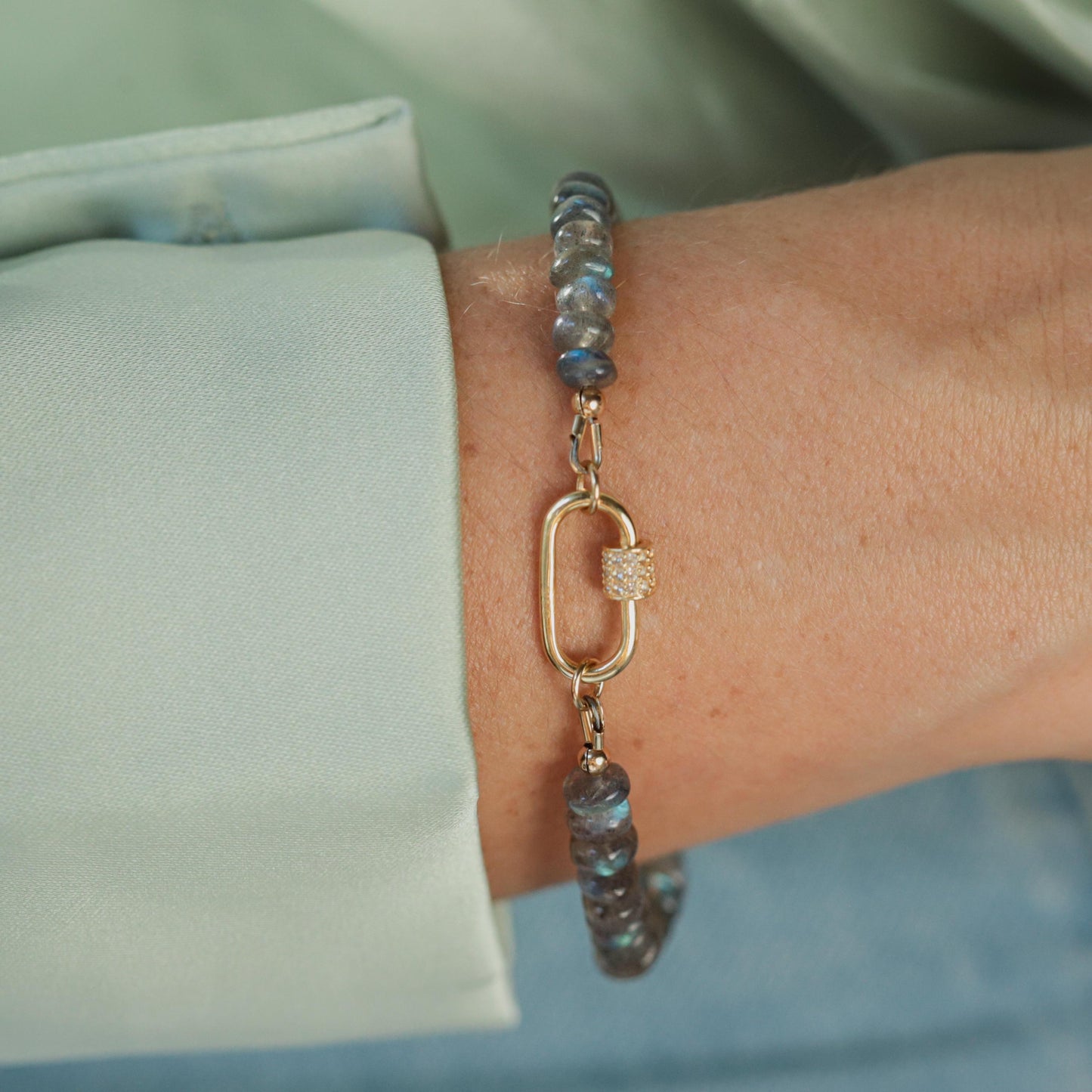 Blue fire bracelet featuring Labradorite and White Topaz beads, crafted by Earthly Abundance.