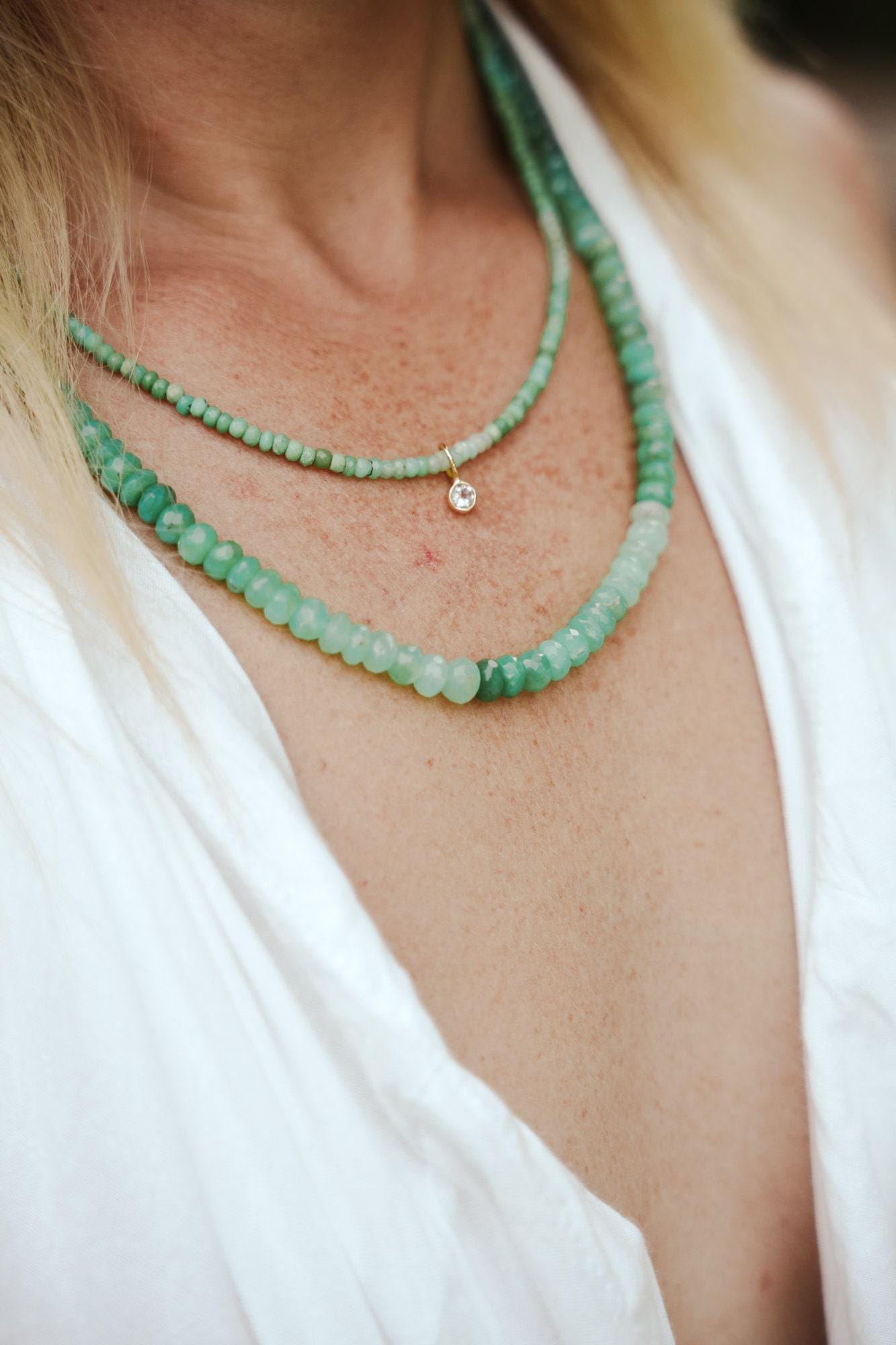 Heart-shaped Chrysoprase pendant necklace from Earthly Abundance featuring a polished green gemstone on a delicate chain.