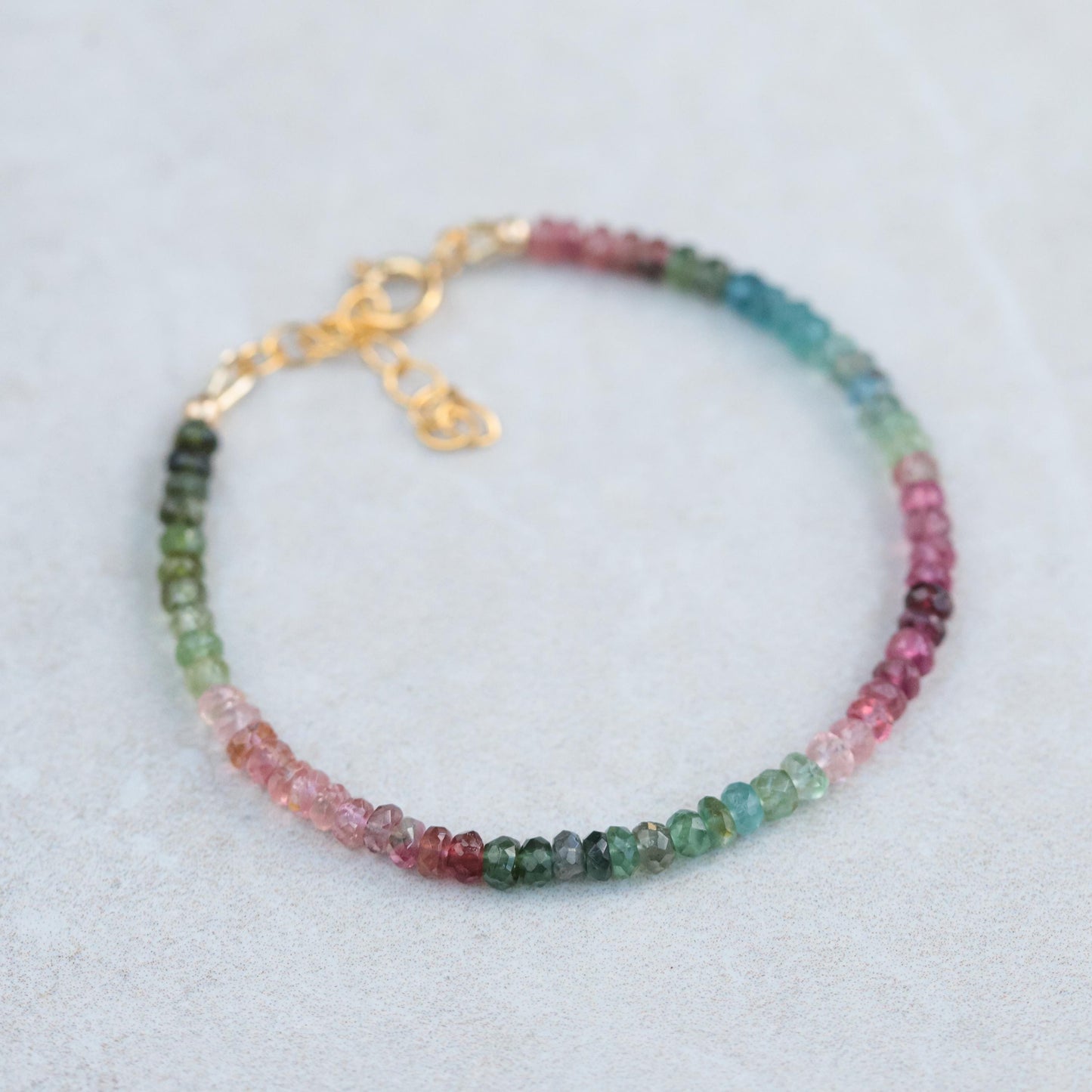 Earthly Abundance Eden Tourmaline bracelet featuring multicolored tourmaline stones on a delicate silver chain.