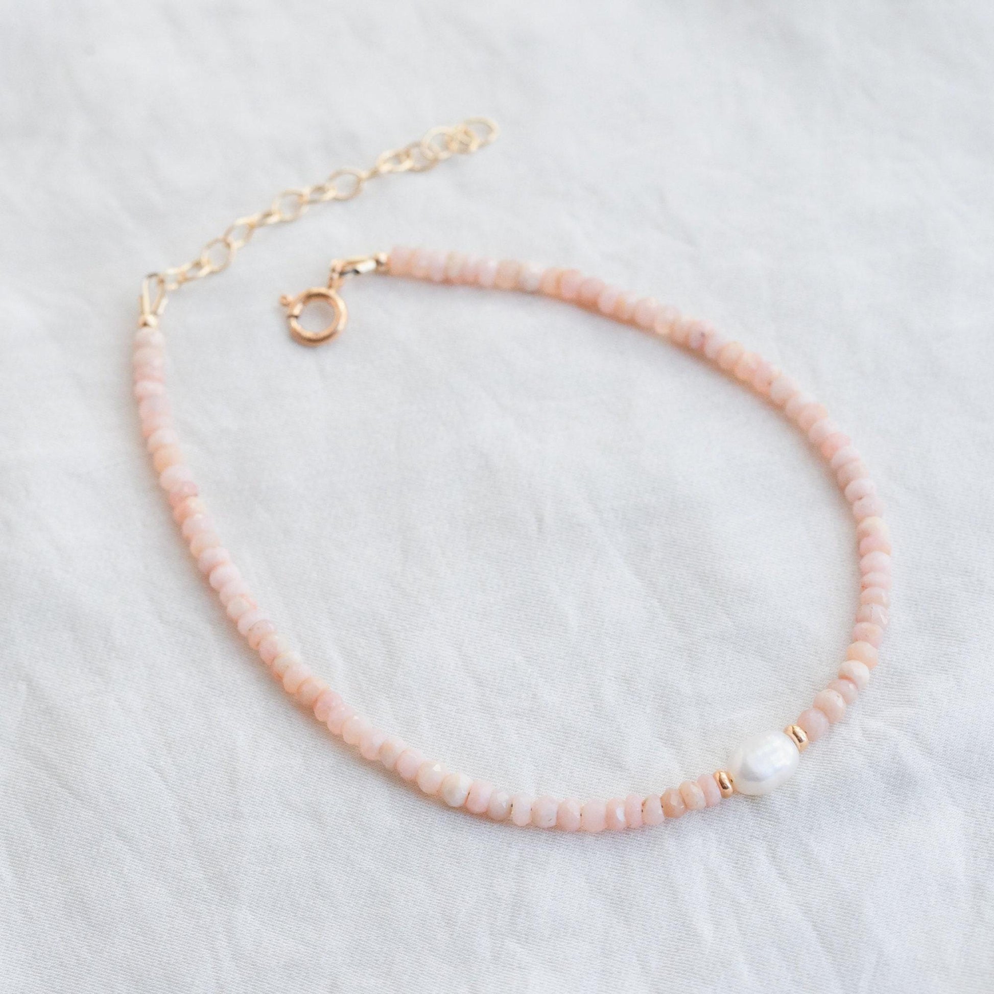 14K gold-filled Sea Blush Anklet by Earthly Abundance featuring delicate chain with sea-inspired charm and adjustable clasp