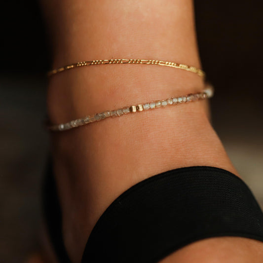 a close up of a person wearing a bracelet