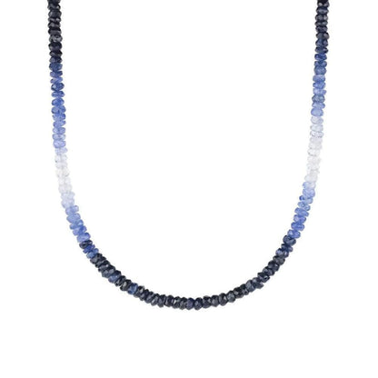 Indigo to sky sapphire necklace by Earthly Abundance Jewelry featuring a gradient blue gemstone pendant on a silver chain