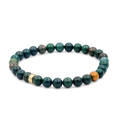 Grounded Strength Bloodstone bracelet featuring polished bloodstone beads on an adjustable cord, by Earthly Abundance.
