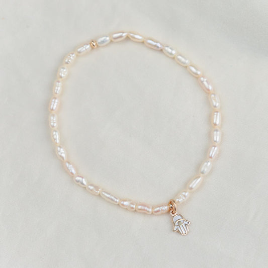 Feshwater pearl rondel with heart bead