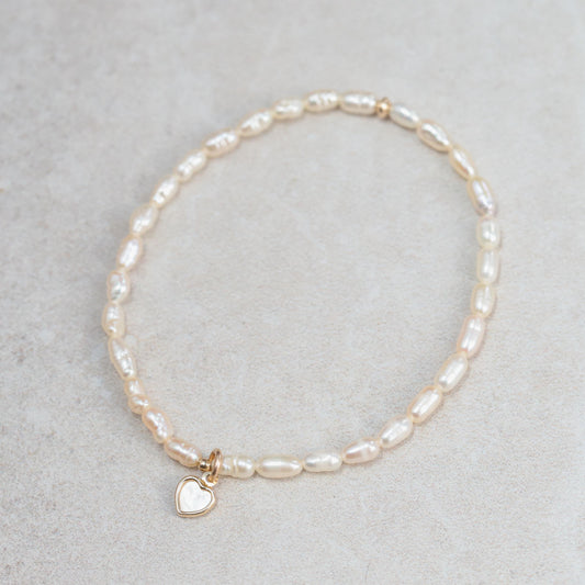 Feshwater pearl rondel with heart bead