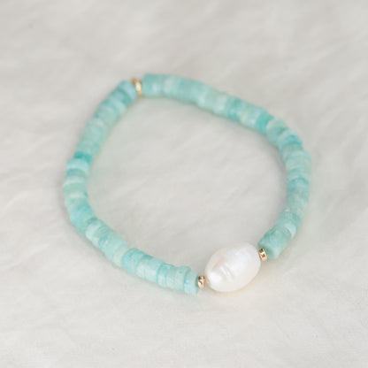 Heishi gemstone and pearl bracelet by Earthly Abundance featuring round beads and a delicate, natural design.