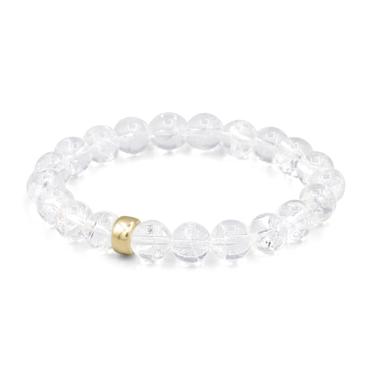 8mm clear quartz bracelet with 14K gold accents from Earthly Abundance, featuring polished, transparent gemstones on a delicate string.
