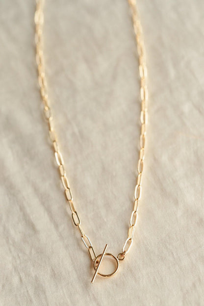 14K gold filled everyday necklace from Earthly Abundance featuring a simple, elegant gold chain on a neutral background.