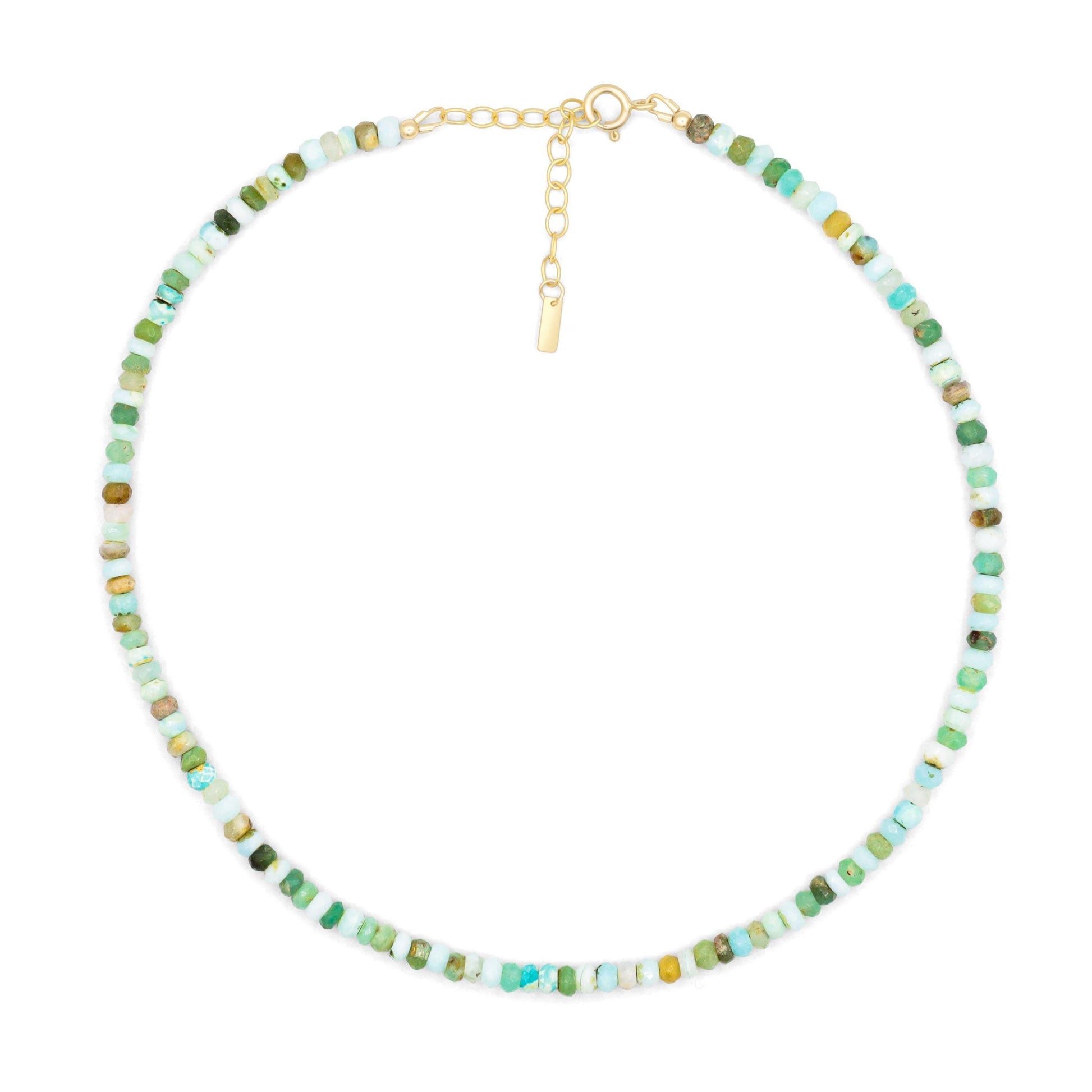 Peruvian opal necklace with polished beads from Earthly Abundance, featuring vibrant orange and blue hues on a delicate string.