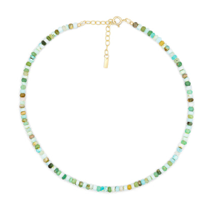 Peruvian opal necklace with polished beads from Earthly Abundance, featuring vibrant orange and blue hues on a delicate string.