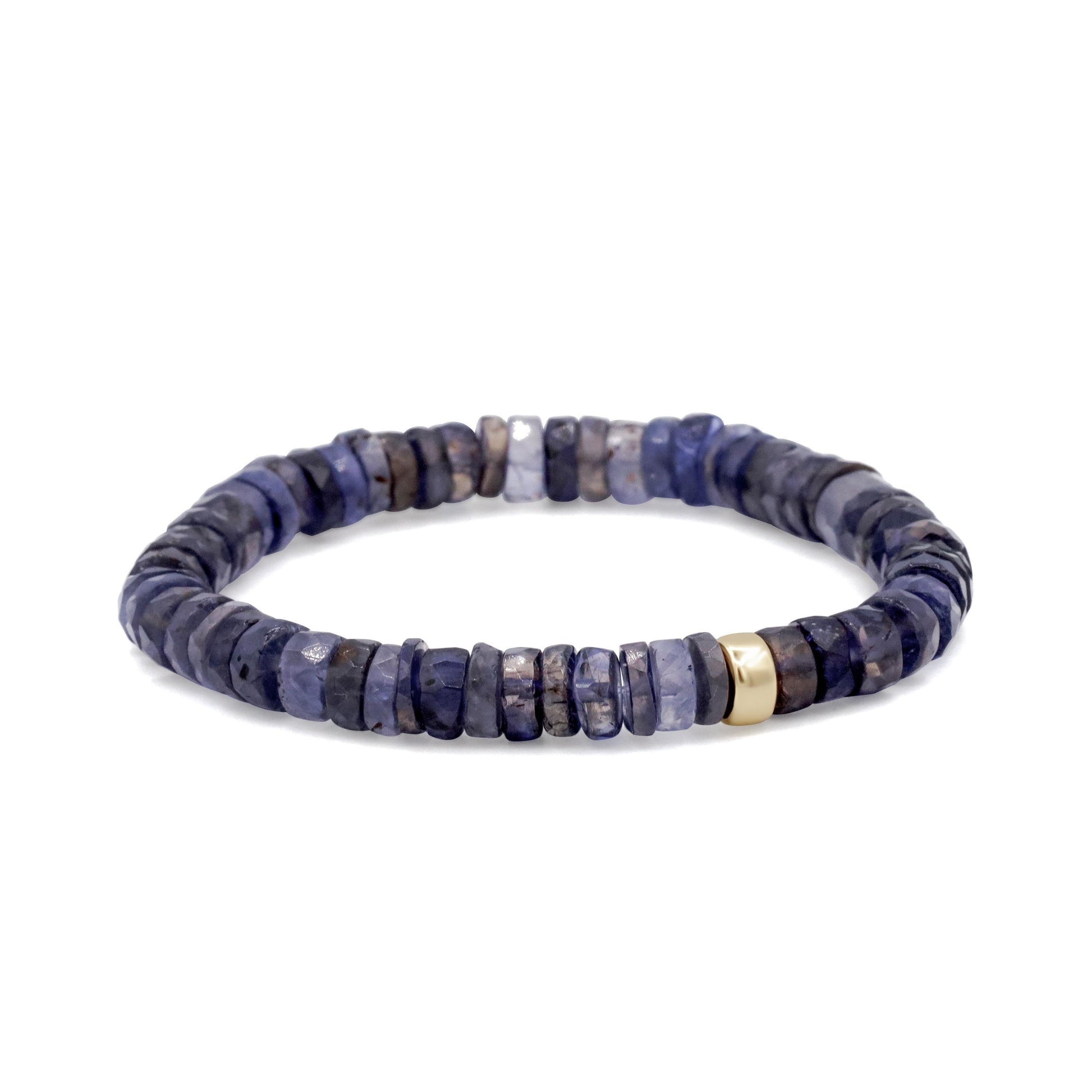 Iolite Heishi bracelet featuring small, smooth, round iolite beads on a stretchy cord, stylish and versatile jewelry accessory.