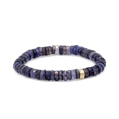Iolite Heishi bracelet featuring small, smooth, round iolite beads on a stretchy cord, stylish and versatile jewelry accessory.