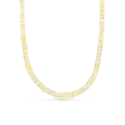 Yellow sapphire necklace with a gold chain from Earthly Abundance, featuring a vibrant yellow gemstone pendant.