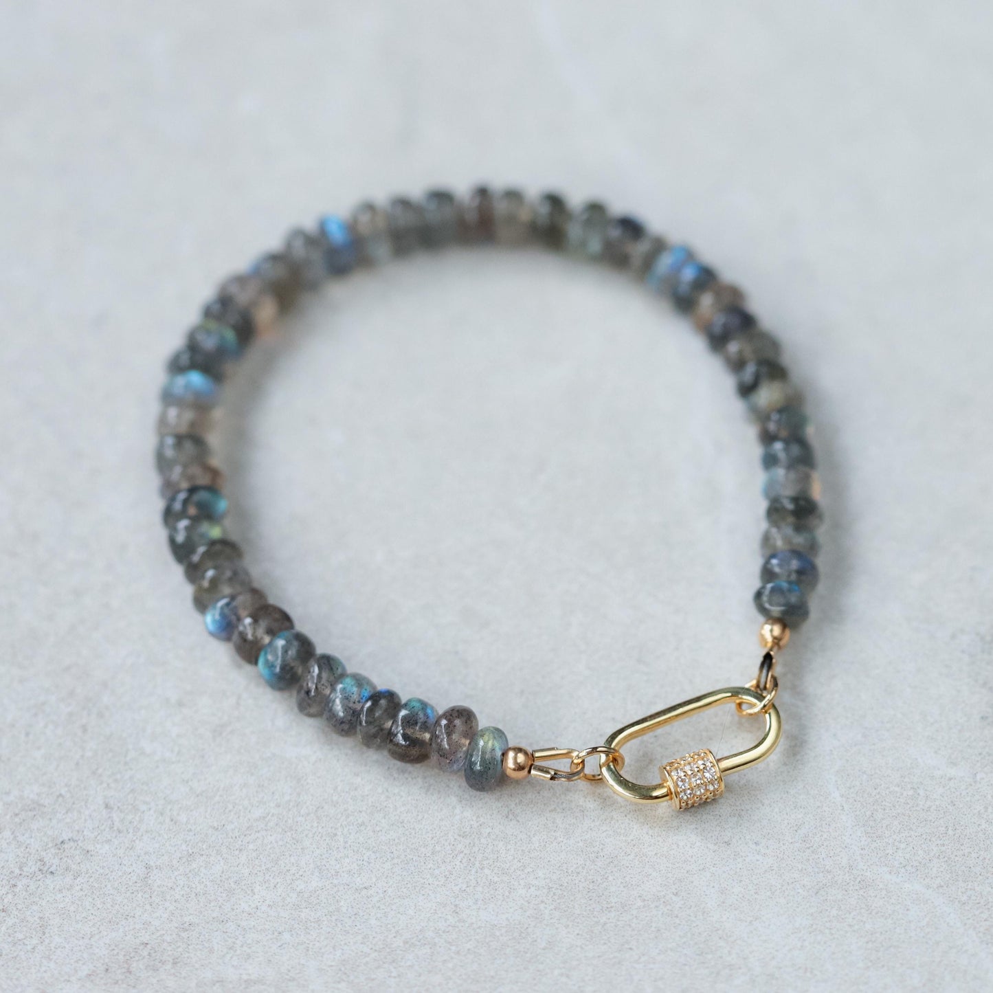 Blue Fire Bracelet with Labradorite and White Topaz beads, featuring a silver clasp, from Earthly Abundance.