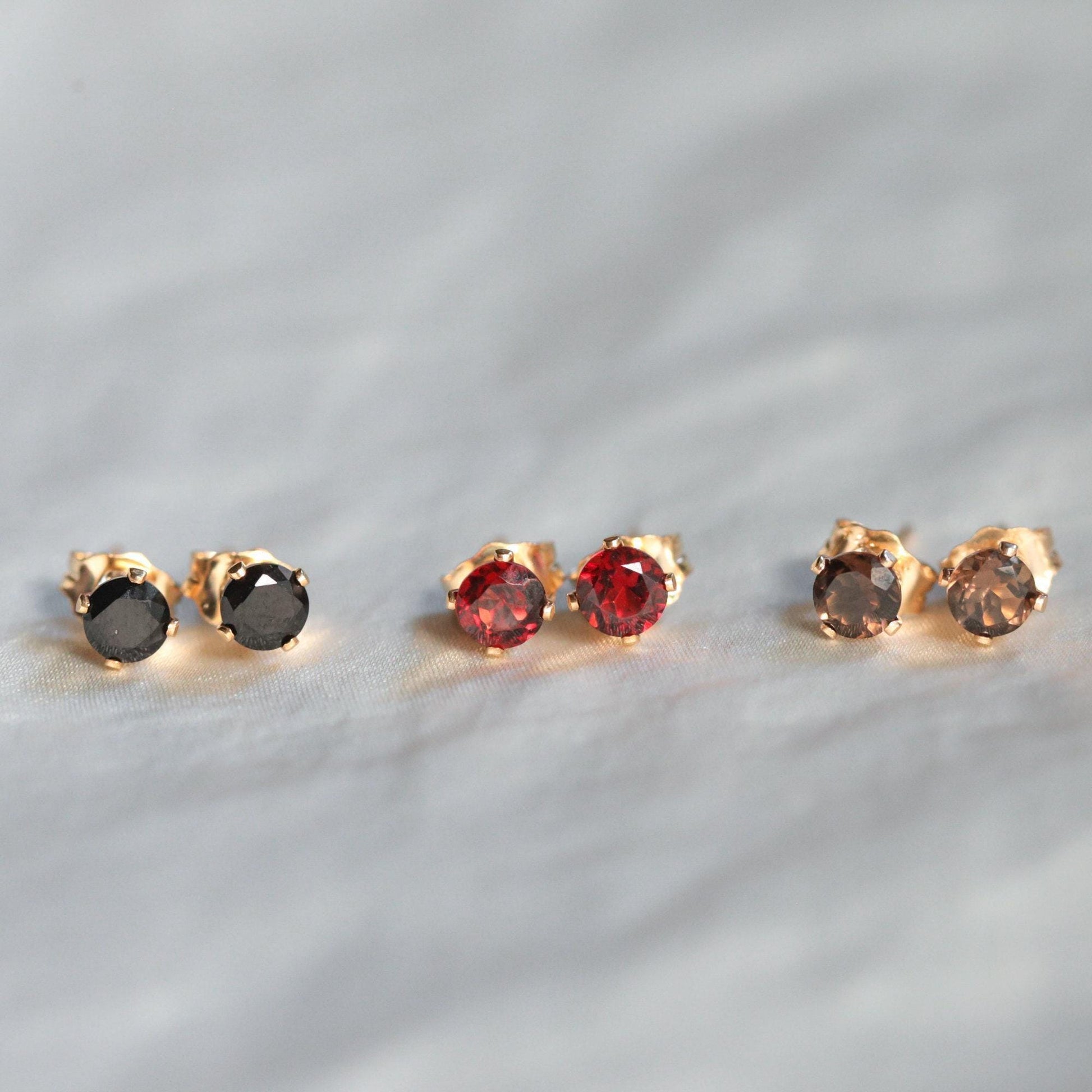 Garnet studs - 14K