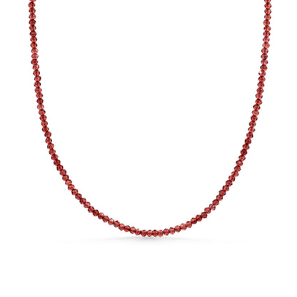 Earthly Abundance garnet 2mm necklace featuring small, round deep red garnet beads on a delicate chain.