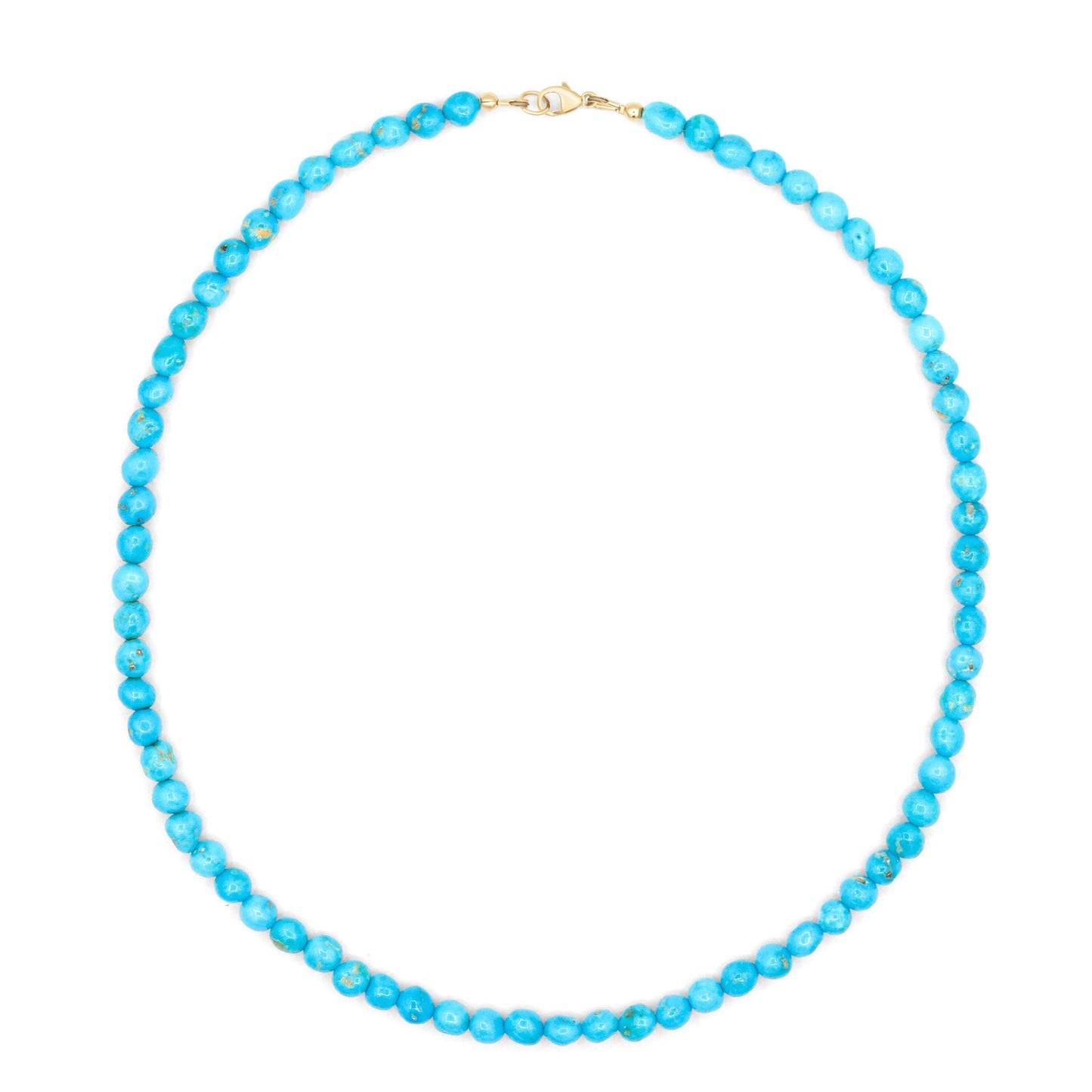 Earthly Abundance Wild Sky Sleeping Beauty Necklace featuring a blue gemstone pendant on a delicate silver chain.