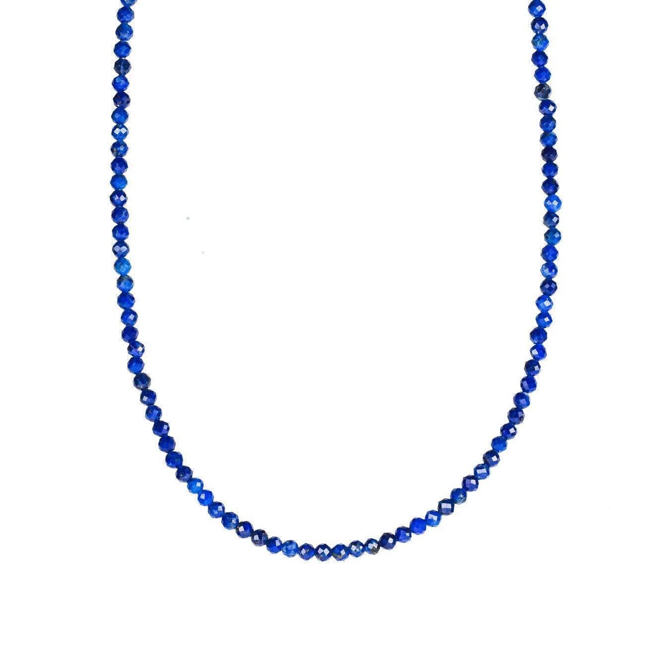 Lapis lazuli necklace with 2mm beads from Earthly Abundance Jewelry, showcasing deep blue stones and silver clasp.