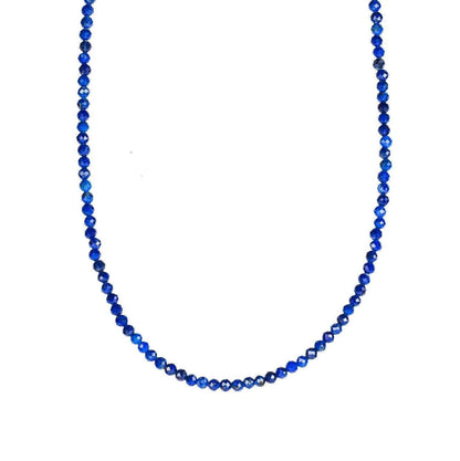 Lapis lazuli necklace with 2mm beads from Earthly Abundance Jewelry, showcasing deep blue stones and silver clasp.