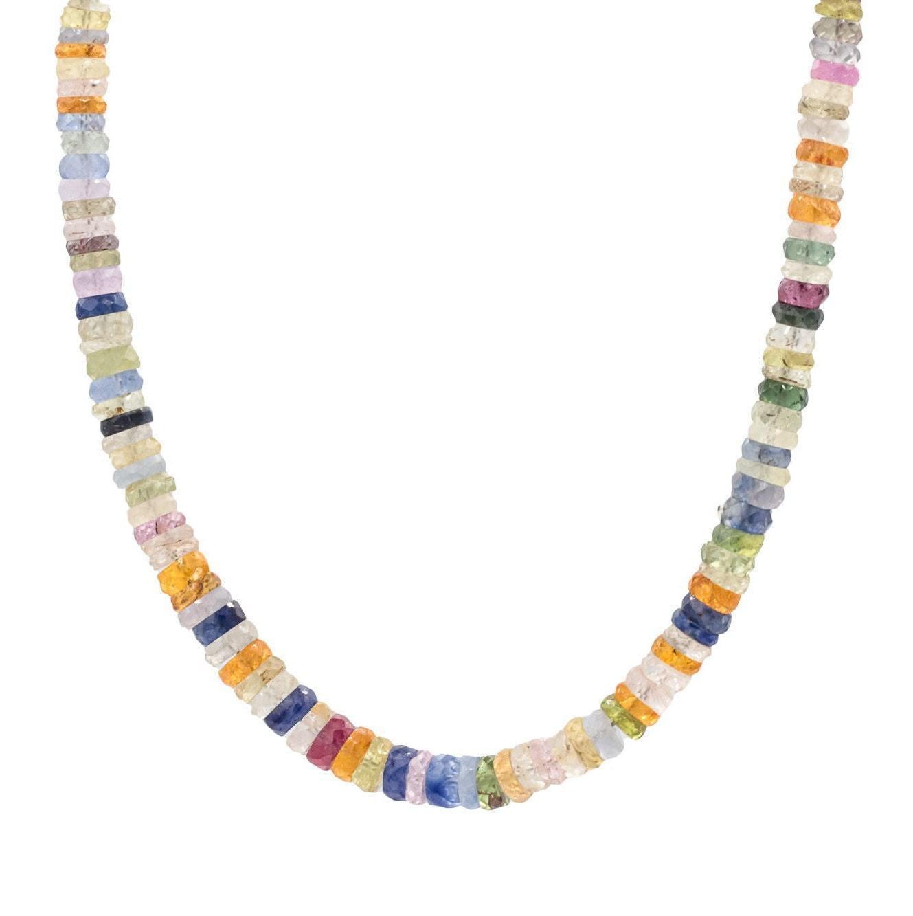 Multi sapphire necklace featuring vibrant blue and pink sapphires set in a delicate gold chain, by Earthly Abundance Jewelry.