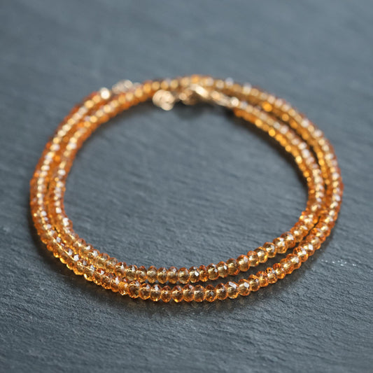 Golden Hour Citrine Necklace by Earthly Abundance featuring a large, polished citrine gemstone pendant on a delicate gold chain.