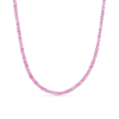 Pink sapphire necklace by Earthly Abundance featuring a delicate chain with vibrant pink sapphires and elegant design.